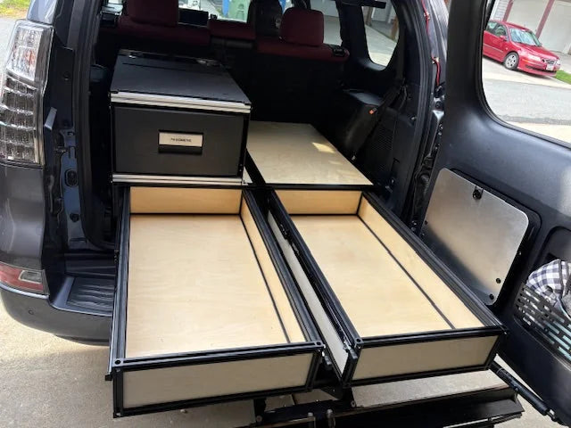 Cargo drawers, deck platforms, and accessories for organized vehicle storage.